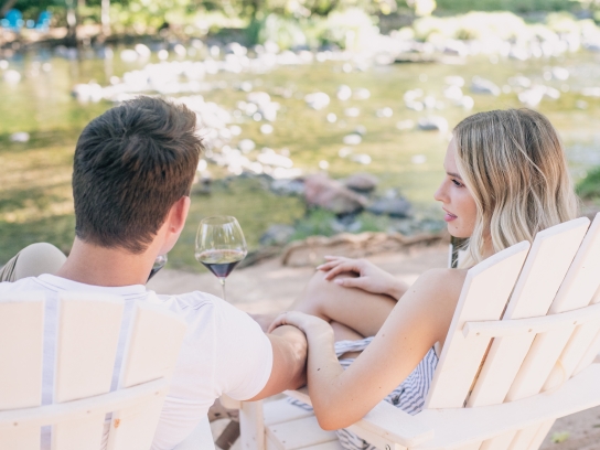 Couple drinking wine on Duck Beach