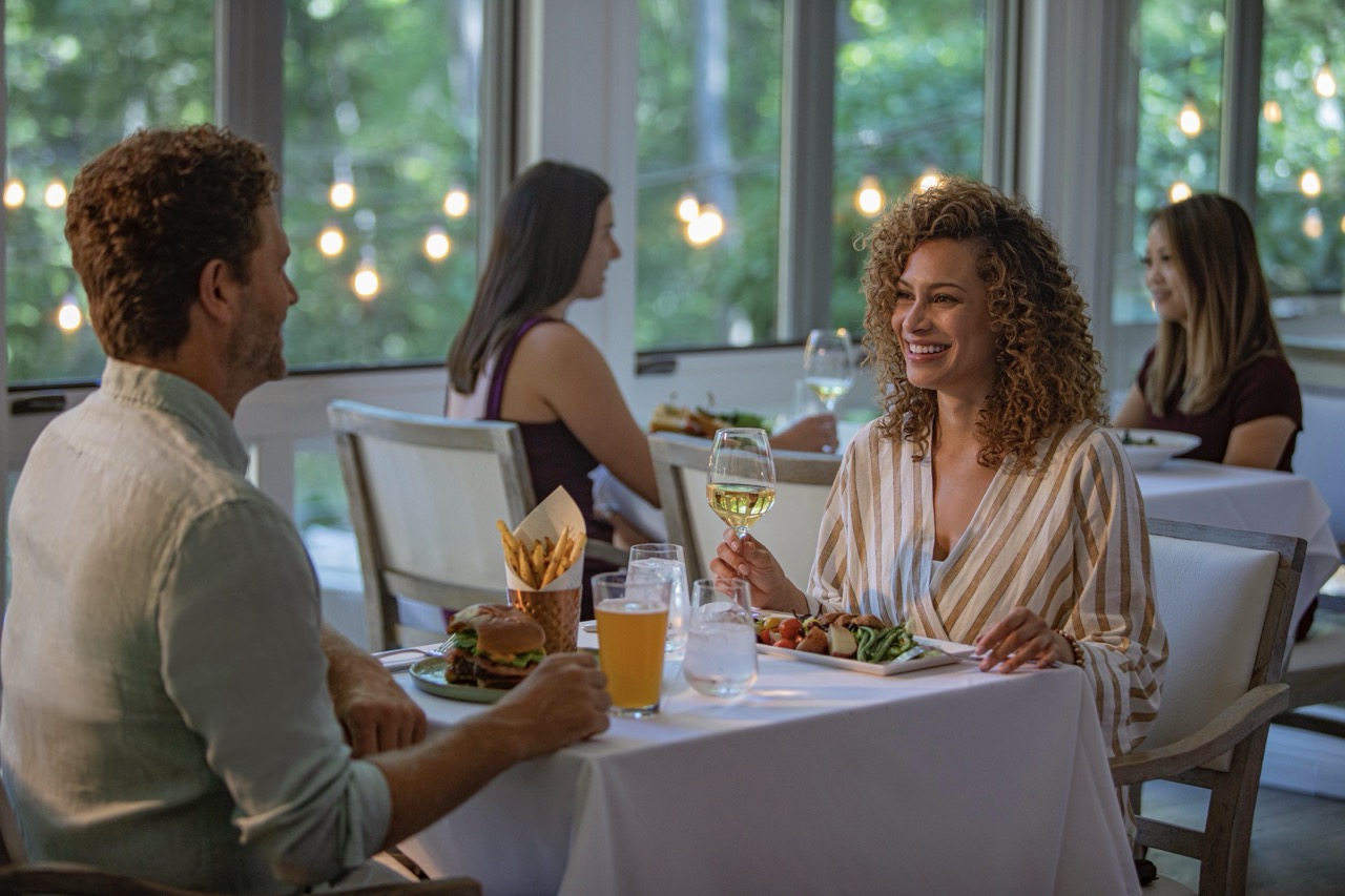 People enjoying a meal at the Cress restaurant on Oak Creek