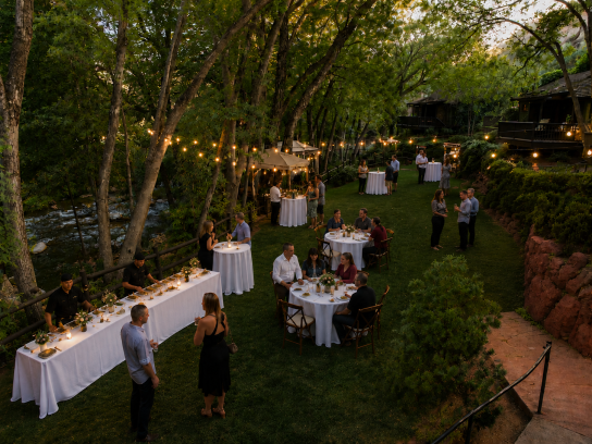 Beer Dinner on Cottageside Lawn with cocktail tables and food stations along the creek